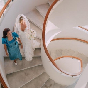 The Aquila - The bride decends the central staircase at the Aquila.